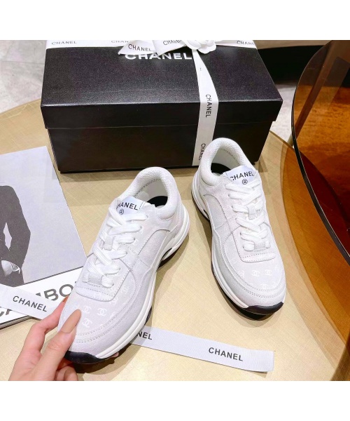 CHANEL CC PRINTED LOGO SNEAKERS 