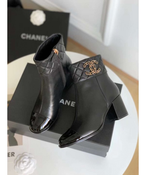 CHANEL CC LEATHER BOOTS